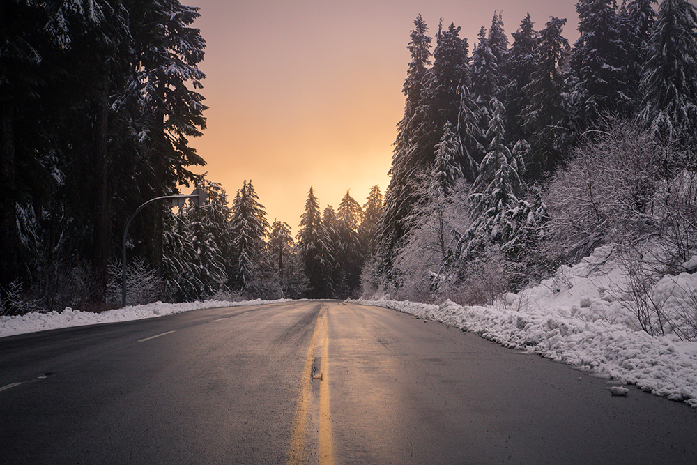 Snow sunset driving down the Mount Seymour Parkway